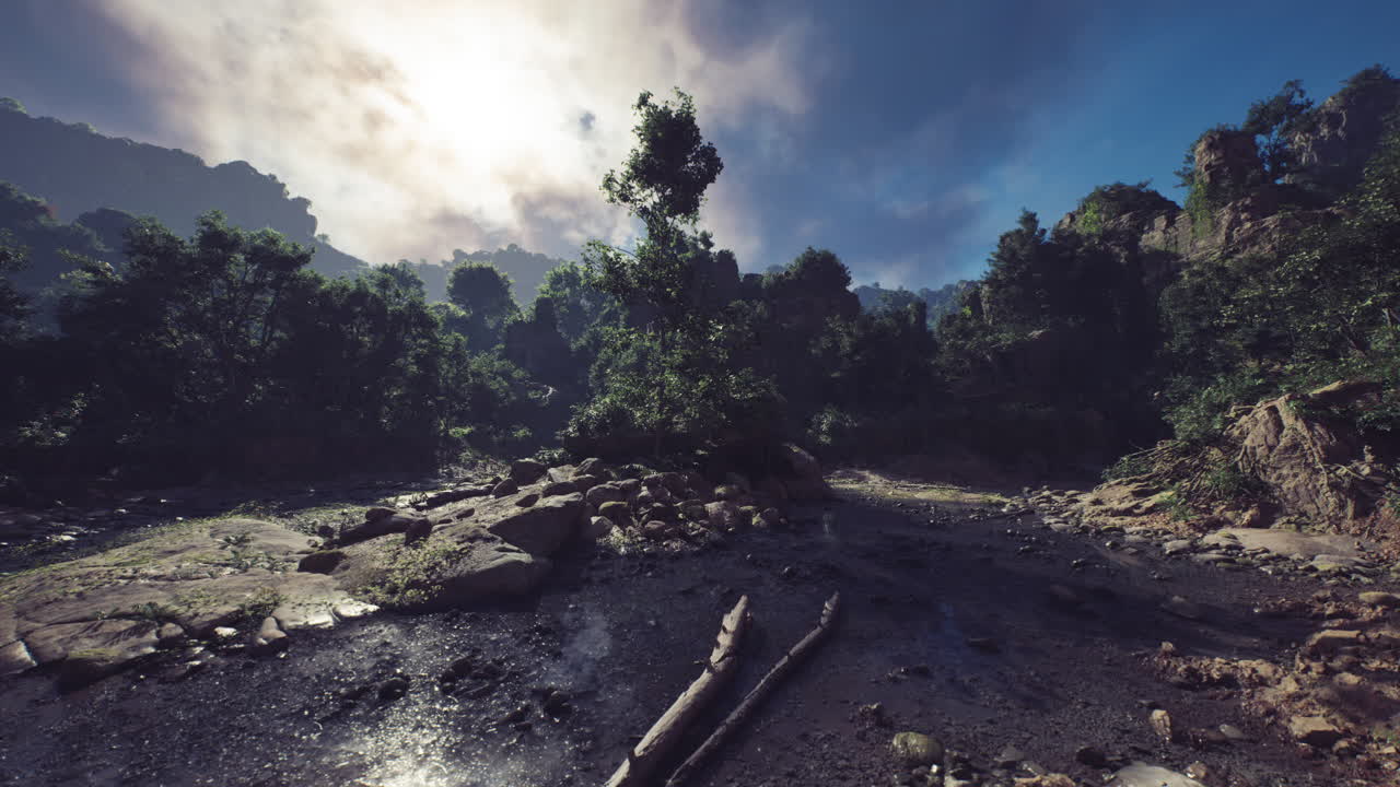 Lush forest landscape in laos with rocky terrain and cloudy skies