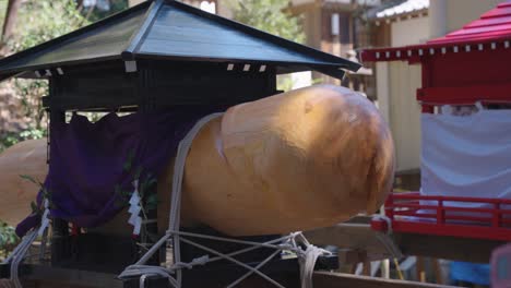 giant penis carved from japanese cypress wood for fertility festival honensai