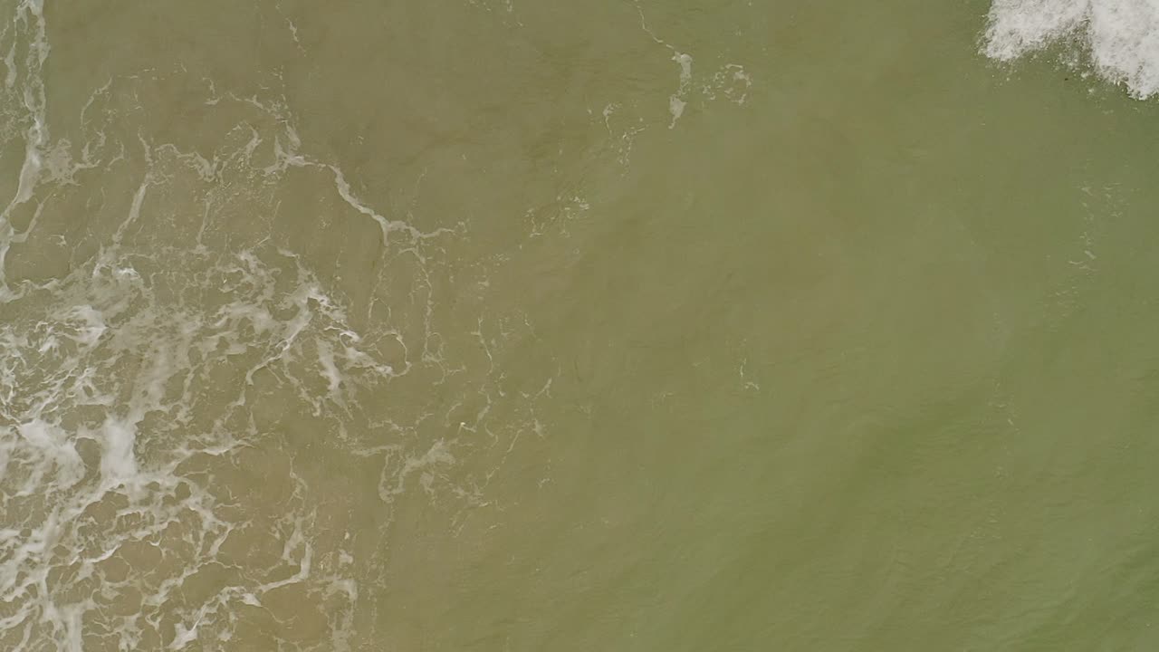 Slow Motion Ocean Waves with Murky Water in Surigao del Norte, Philippines