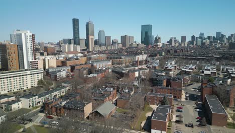 aerial pullback away from downtown boston cityscape