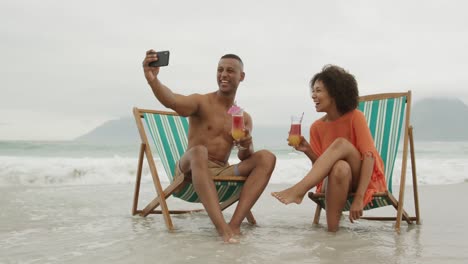 couple enjoying free time by the sea