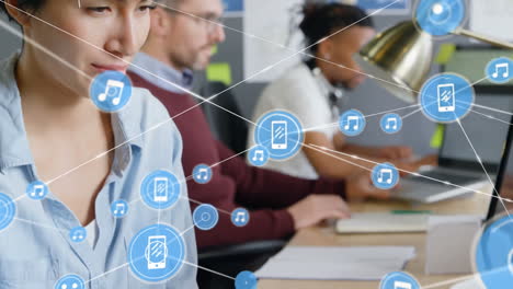 Animation of network of connections with icons over diverse business people in office