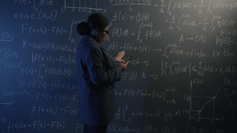female professor or student in a classroom studying