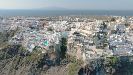 marvel at luxury villas, each with private infinity pools, overlooking the mediterranean's grandeur in santorini