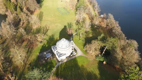 pullback birds-eye drone view building on belle isle bowness-on-windemere