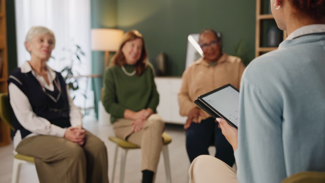 Group therapy session with senior citizens