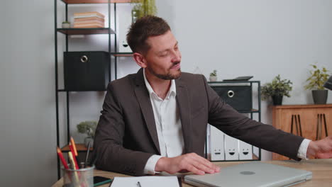 businessman drinking champagne elebrate successful contract agreement after working on office laptop