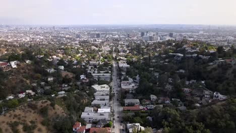 Aerial-panoramic-view-of-Hollywood-houses-and-Los-Angeles-cityscape,-California