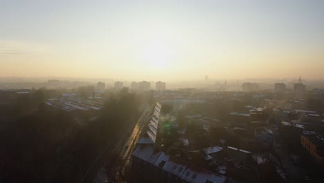 aerial view over polish city showing toxic fumes, emissions and smog