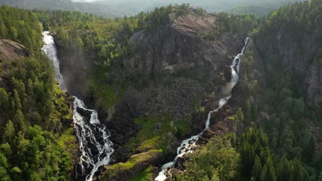 latefossen is one of the most visited waterfalls in norway and is located near skare and odda in the region hordaland, norway. consists of two separate streams flowing down from the lake lotevatnet.