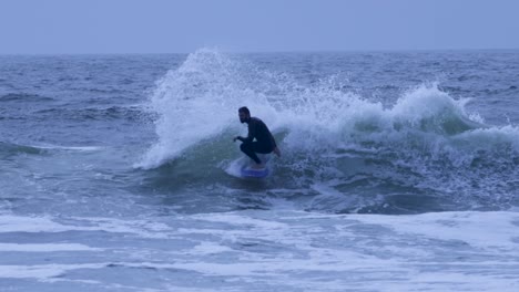 young surfer ripping in europe waves, cascais