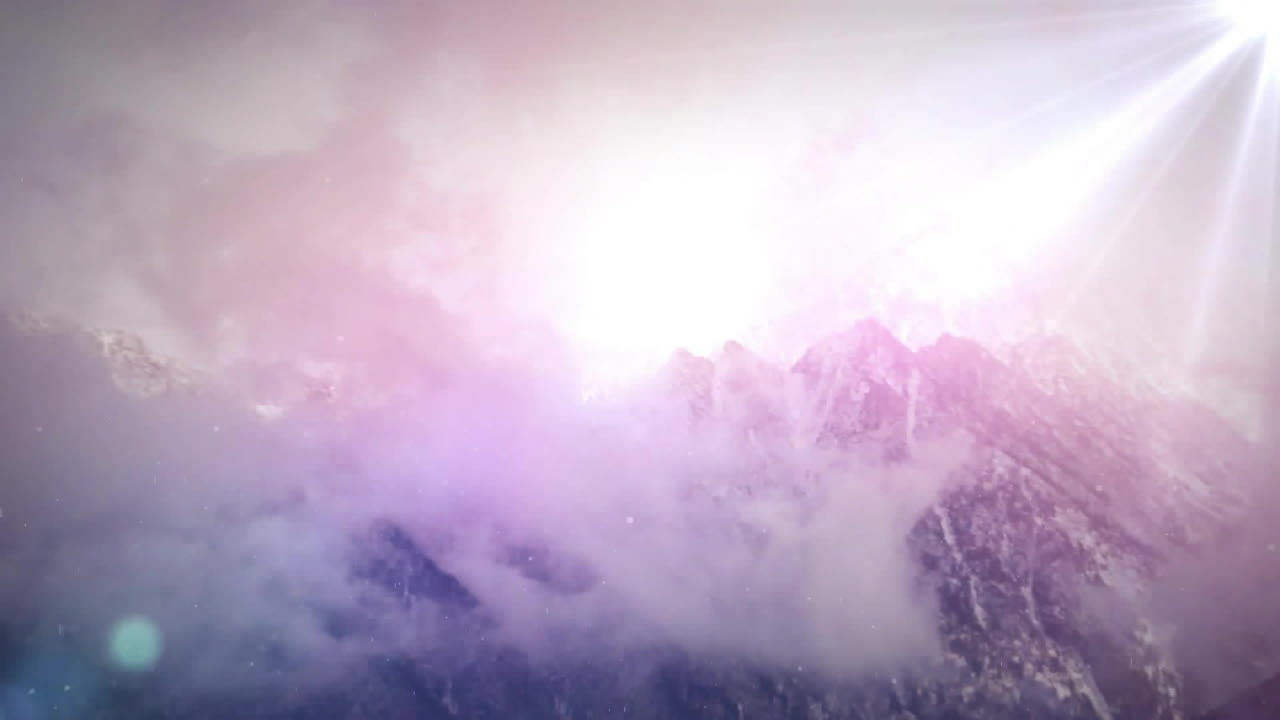 Animation of glowing lightss moving over clouds and mountains background