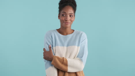 pretty young woman posing in sweater