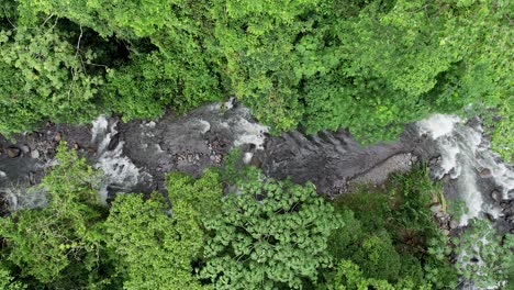 White-water-rapids-of-jungle-river-flowing-in-Costa-Rica-rainforest