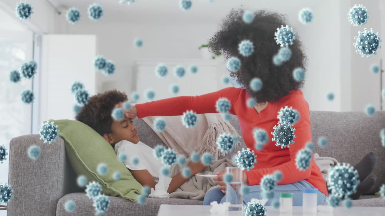 Animation of virus cells over african american mother with sick son