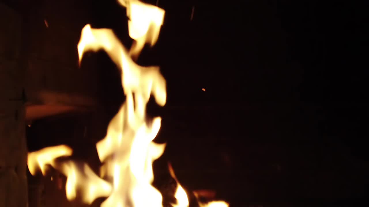 Fire in a fireplace. Fire shooting