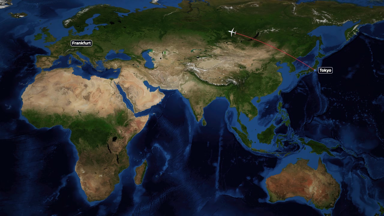A digital world map tracks an airplane flying from Tokyo to Frankfurt with red lines