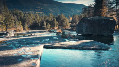 shallow otra river flows in the rocky riverbed carved by the glaciers