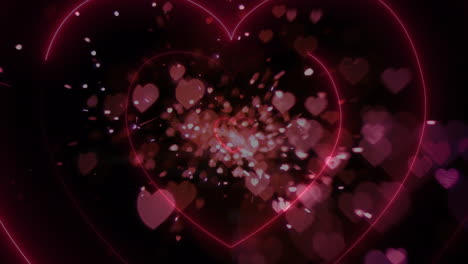 animation of red heart and glowing heart shapes on black background