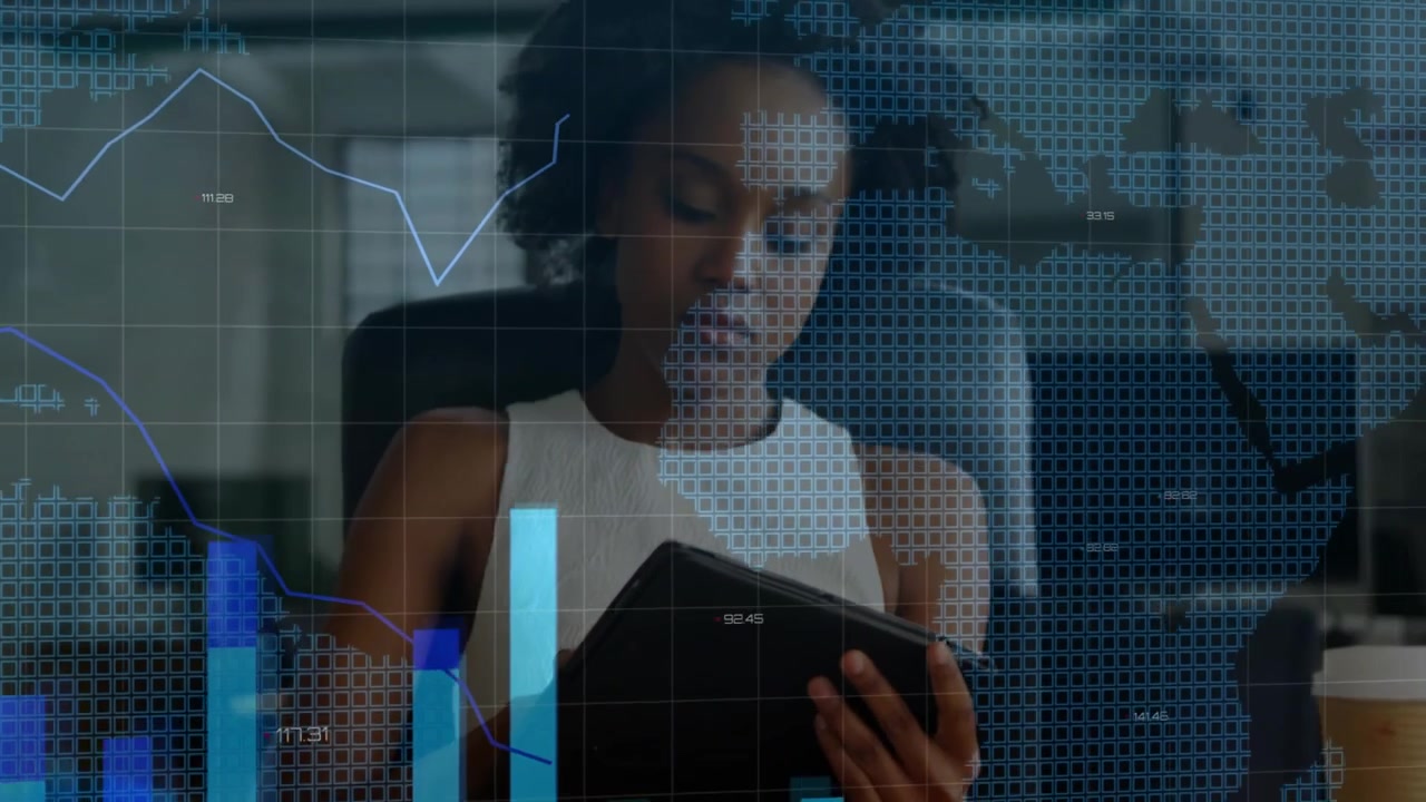Business analyst powering on tablet activating grid overlay and tapping rising charts mapping data