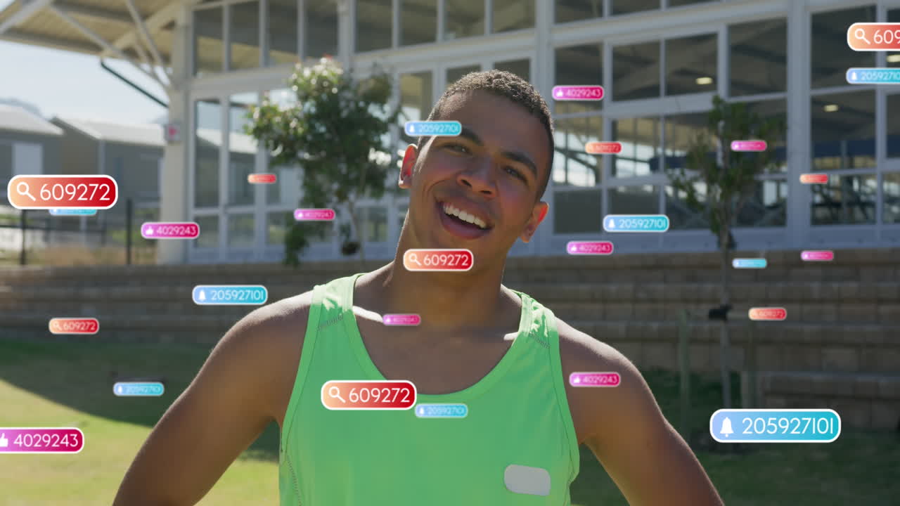 Animation of social media data processing over happy biracial footballer on field