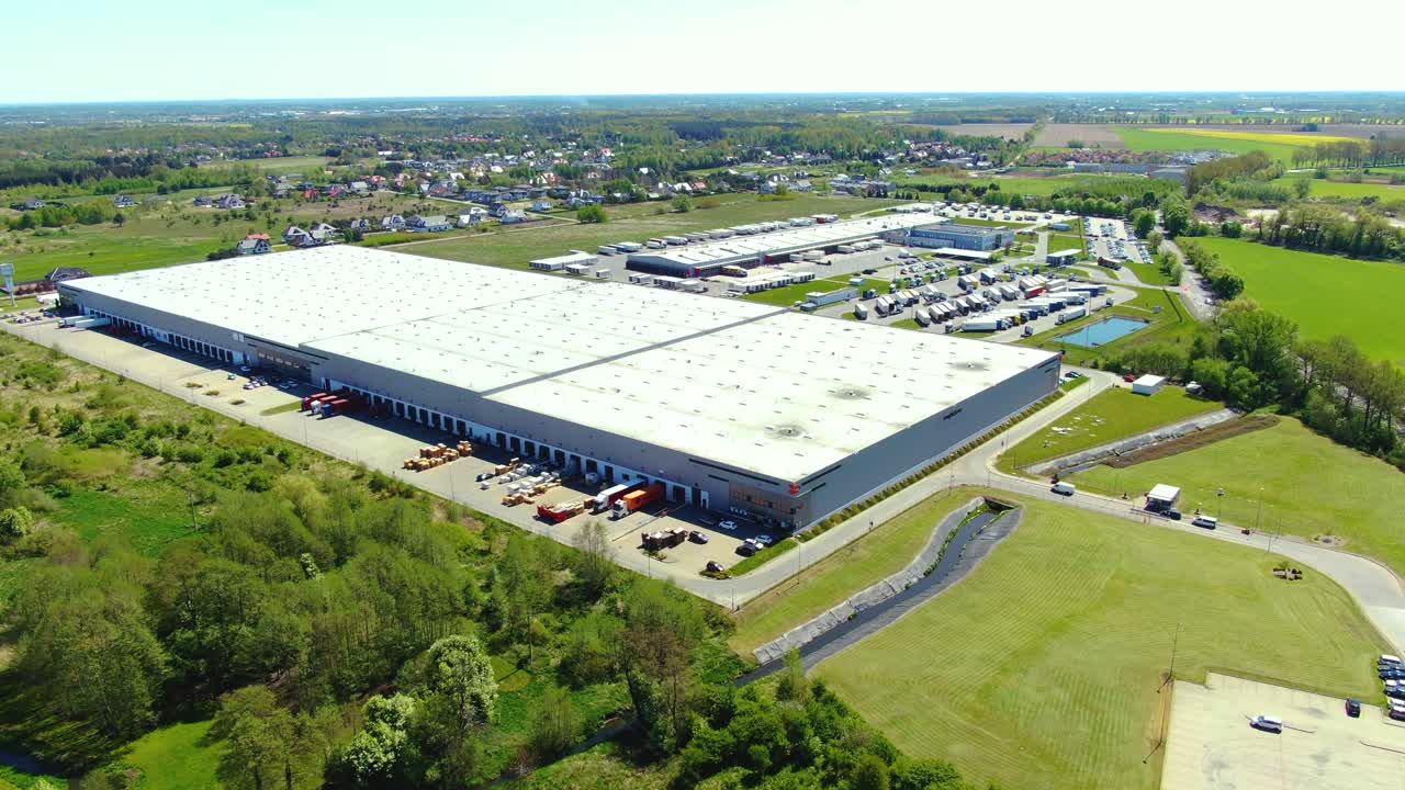 Aerial view of warehouse storages or industrial factory or logistics center from above