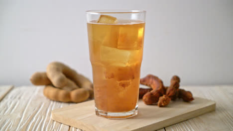 delicious sweet drink tamarind juice and ice cube - healthy drink style