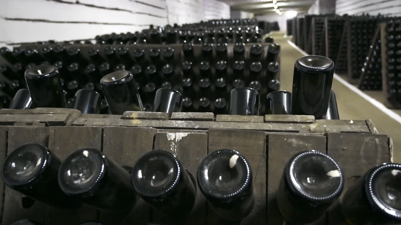 Wine bottles in a winery cellar underground