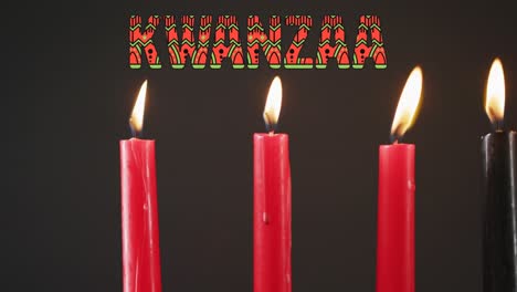animación de velas de texto kwanzaa sobre un fondo negro.