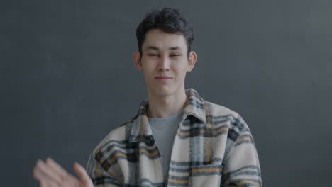 man waving hello