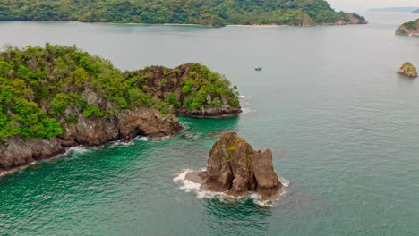 4k aerial drone shot of isla tortuga in tambor, costa rica