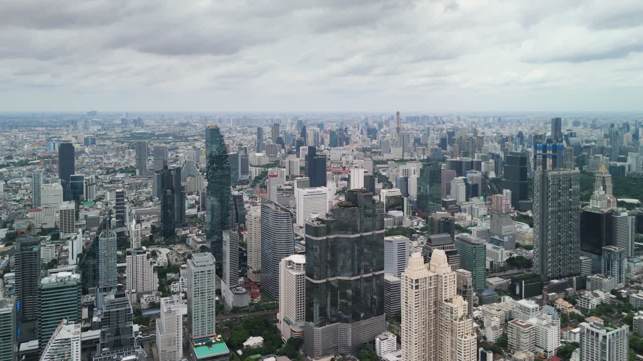 Bangkok City Skyline Aerial — Clear Midday Drone Shot of Modern Financial District and High-Rise Towers