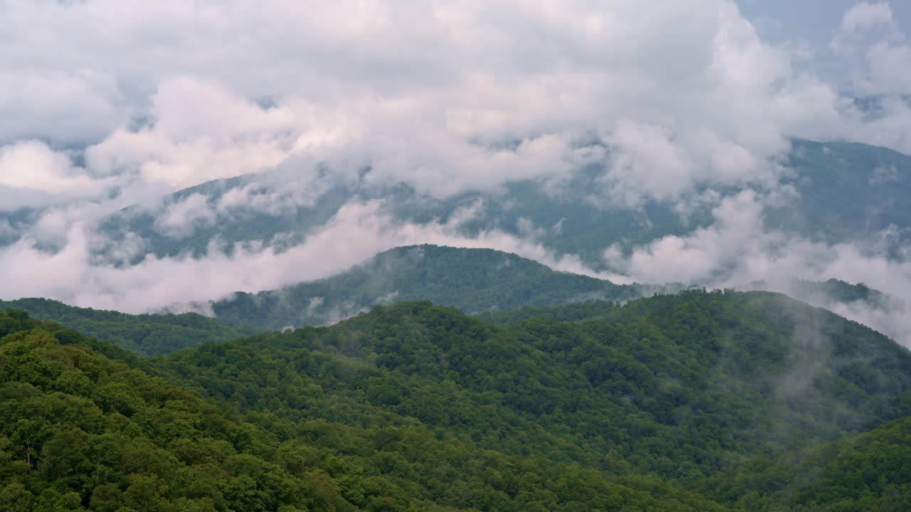 Dramatic cloud front meets thick mist in the heart of the Smoky Mountains