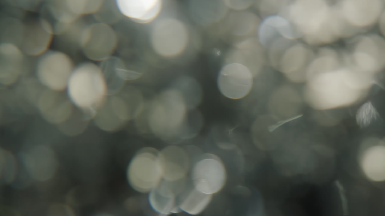 Enchantment holiday tinsel soft focus bokeh in 4K