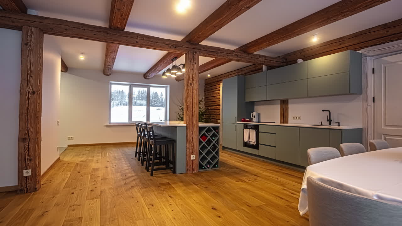 casa de campo de concepto abierto: cocina y comedor con una decoración rústica moderna