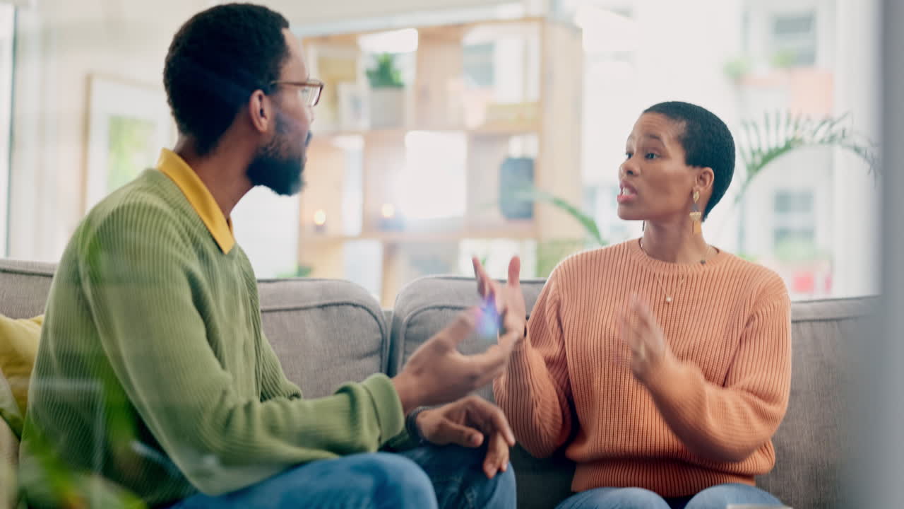Divorce, fight and couple argue on sofa