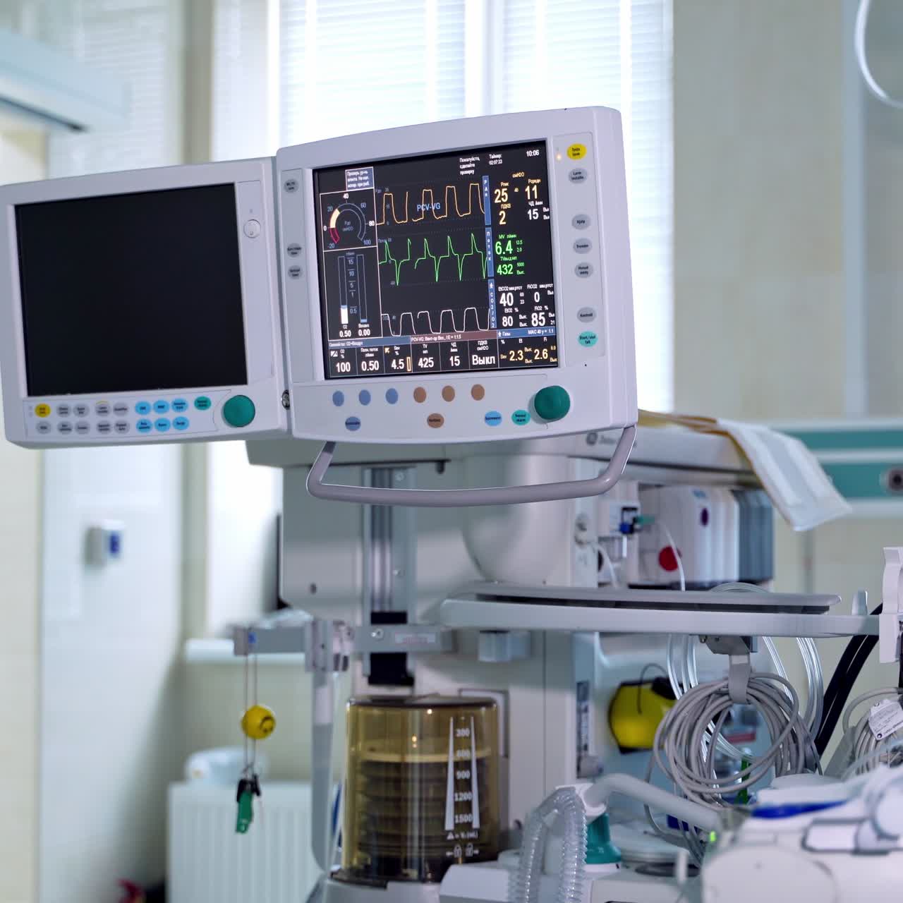 Contemporary medical system in the operating room. Monitor and machine ventilator in hospital theater. Modern equipment to show vital signs of a patient in the hospital.