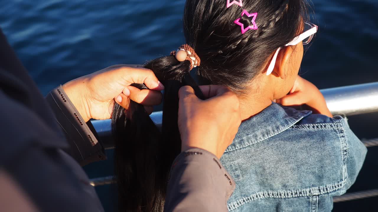Braiding a girl's hair