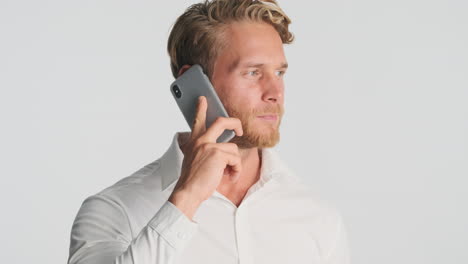 young man having a conversation via phone