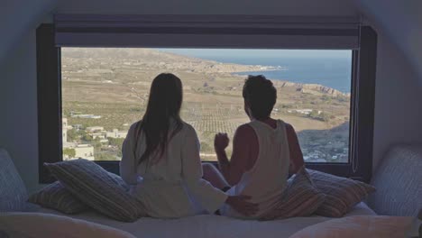 young couple celebrates achieving the goal of a romantic vacation in the mediterranean