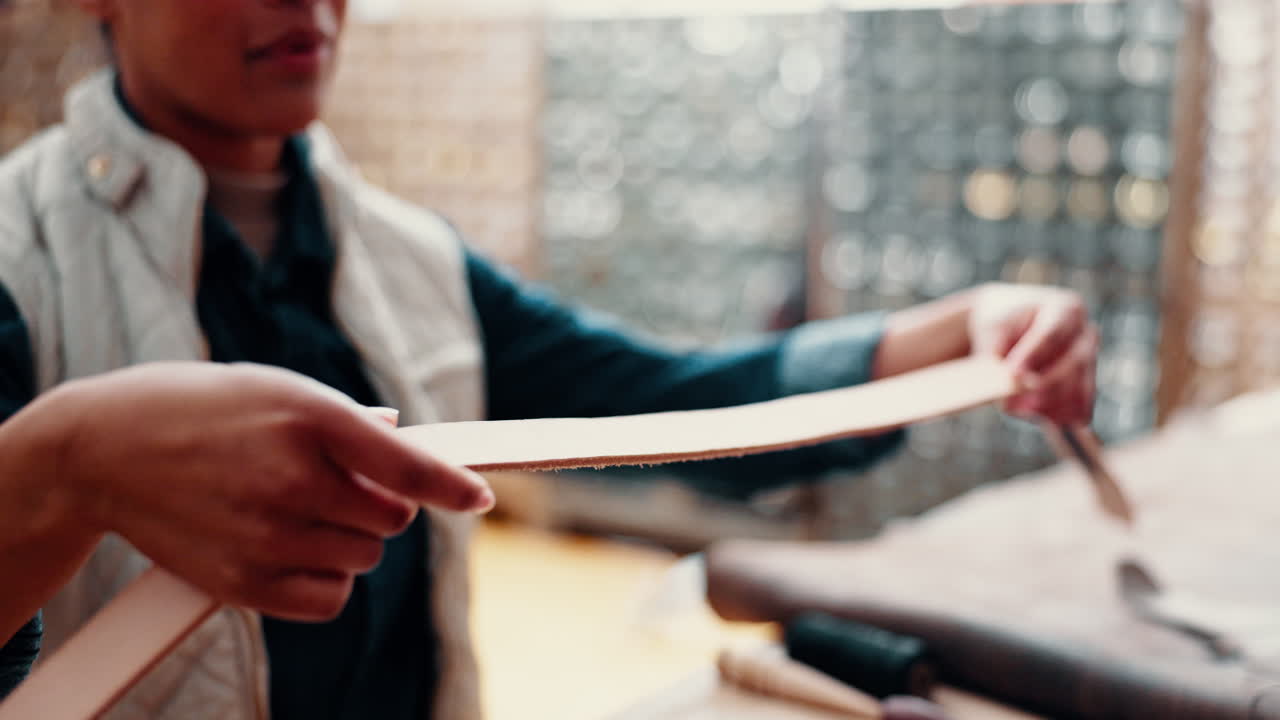 Hands, leather belt and quality control