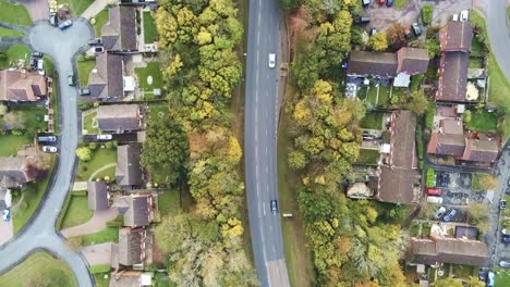 suburb roads junction roundabout aerial view tracking traffic looking down