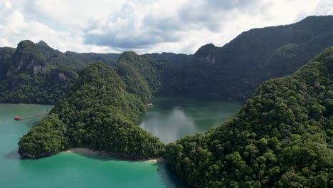 stunning view of dense tropical mountains with dayang bunting lake, langkawi, malaysia