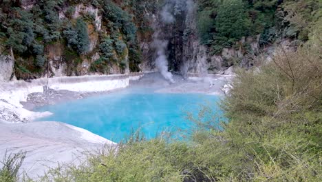 waimangu volcanic rift valley vivid blue green inferno crater lake hotspring in rotorua, new zealand aotearoa