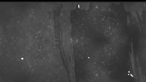 animazione di più puntini che si muovono in movimento ipnotico su uno sfondo grigio afflitto