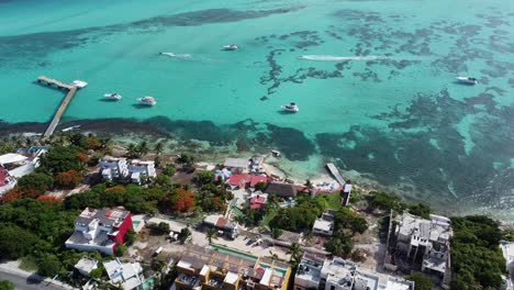 Aerial-drone-zoom-in-shot-over-wooden-piers-along