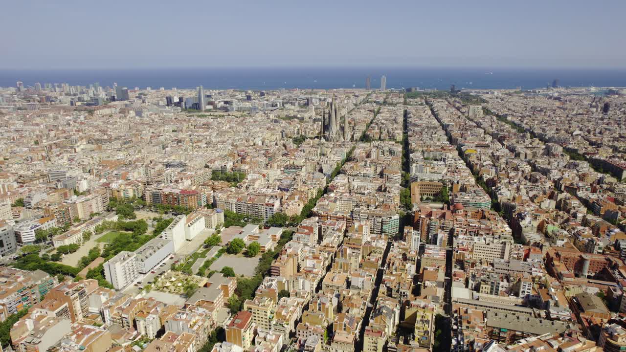 Aerial Panorama of Barcelona Cityscape with Sagrada Familia and Mediterranean Sea