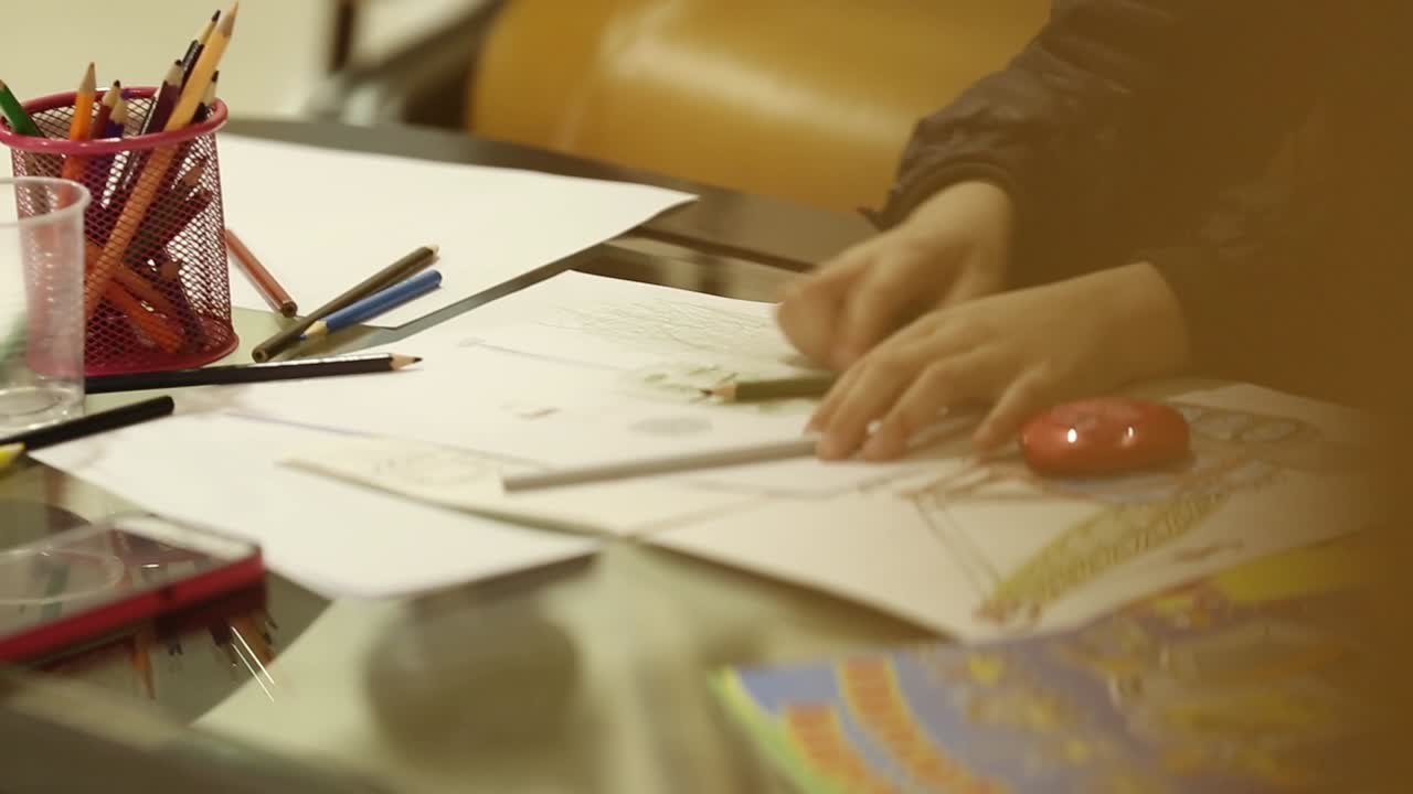 Children Paint Pencils. Preschool class drawing at table in classroom in playschool