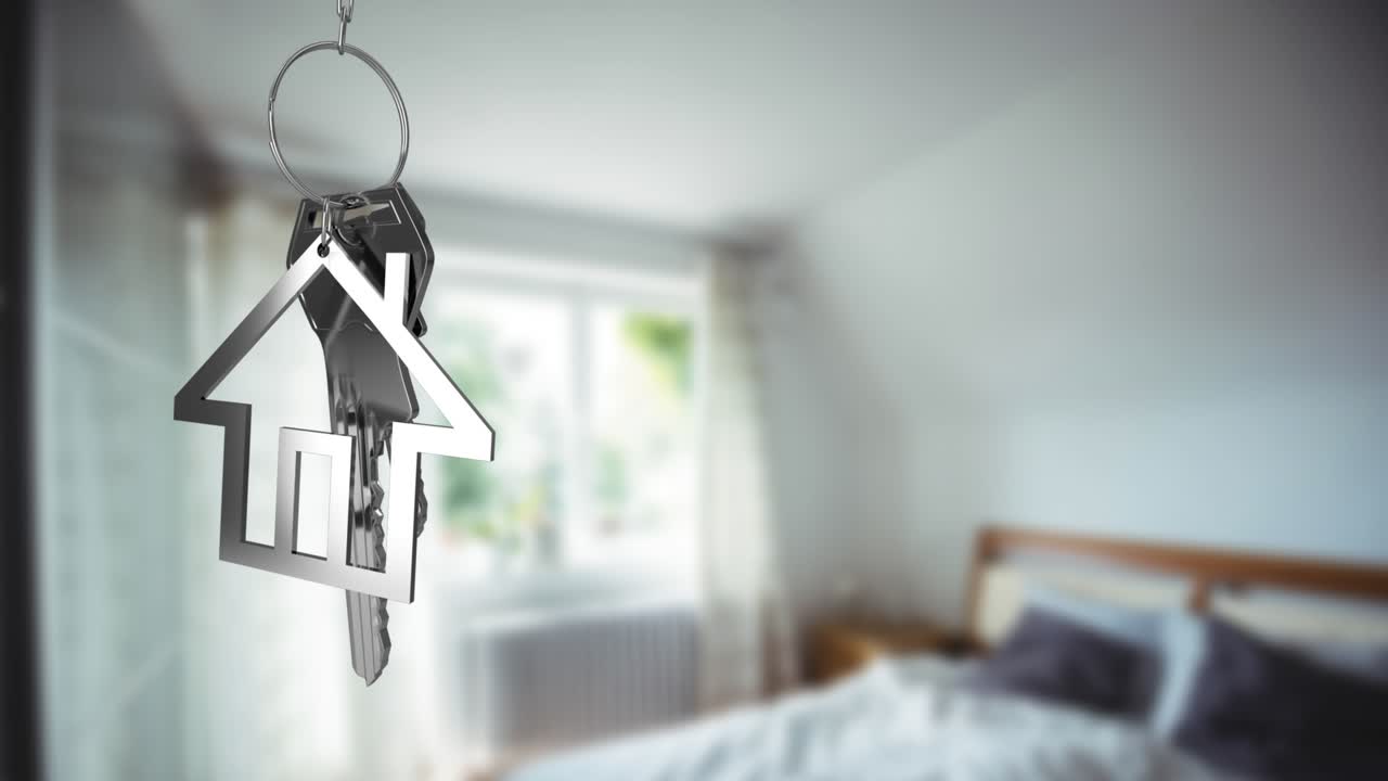 Animazione di chiave con portachiavi a forma di casa su un interno di casa