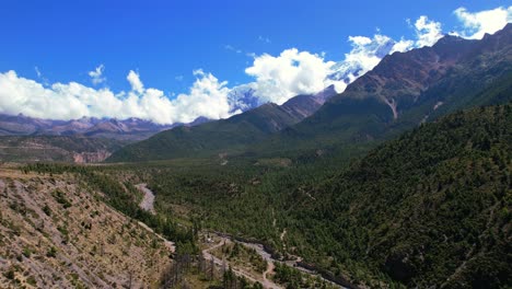 Green-Forest-Covered-Himalaya-Mountains-Valley-in-Mustang-District-Near-Jomsom,-Nepal---Aerial-Flyover